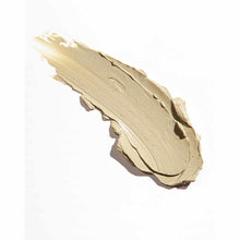 Beige clay product with textured, brushstroke appearance on white background.