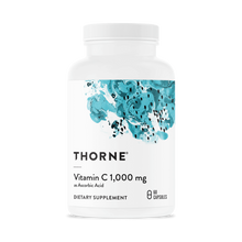 White bottle of Thorne Vitamin C 1,000 mg with turquoise abstract design label and white screw cap.