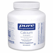 White bottle of Pure Encapsulations Calcium citrate dietary supplement containing 180 capsules with blue label and white scre