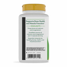 White bottle with gold cap containing Calcium & Magnesium Mineral Complex supplement capsules by Nature's Way.