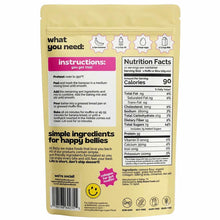 Back of a yellow baking mix pouch showing ingredients needed, pink instructions panel, nutrition facts, and a smiley face logo.