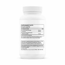 White capsule bottle with white ridged cap displaying supplement facts label for Deep Sleep Complex by Thorne Research.