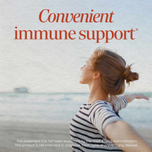 Woman in striped shirt facing ocean with text "Convenient immune support" on package label.