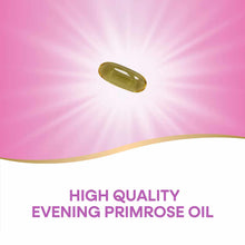 Single golden-yellow oval softgel capsule on pink background.