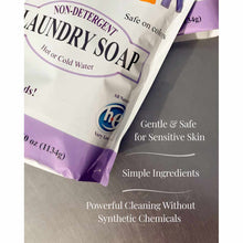White and purple pouch of Grandmas Non-Detergent Laundry Soap labeled for hot or cold water use.