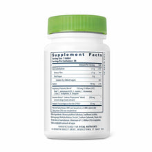 White supplement bottle with green cap displaying Supplement Facts label for probiotic tablets.