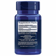 Blue supplement bottle with white label showing Melatonin 3mg dosage information and ingredients.