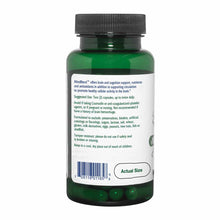 A green glass supplement bottle with a black cap shows a white label with usage directions, warnings, and a barcode.
