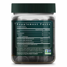 Bottle of Gaia Herbs Nausea Gummies with dark ginger-colored gummies visible inside and green cap with supplement facts label