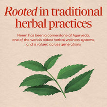 Green neem leaves on a stem with text about traditional herbal practices on a beige background.