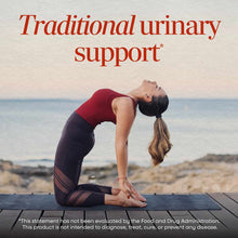 Bottle of Nature's Way Nettle Leaf supplement with red text stating "Traditional urinary support" and woman in yoga pose on b