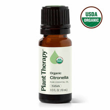 Small amber glass bottle with black cap containing Plant Therapy Organic Citronella Essential Oil, labeled 1/3 fl. oz., with