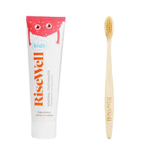 RiseWell kids toothpaste in Cake Batter flavor and natural bamboo toothbrush with yellow bristles.