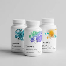 Three white dietary supplement bottles labeled Basic B Complex, Basic Nutrients 2/Day, and Super EPA by Thorne.