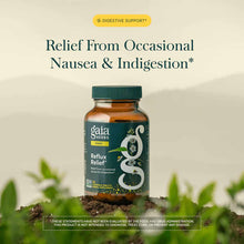 Gaia Herbs Reflux Relief bottle with dark green cap and label, containing 45 vegetable tablets, displayed on soil with green