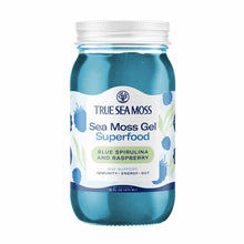 Clear glass jar with white screw-top lid filled with blue-teal sea moss gel, labeled "True Sea Moss" with blue spirulina and