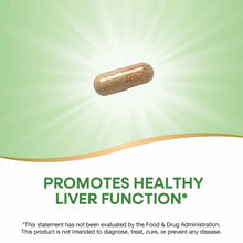 Brown capsule supplement on green gradient background with radiating light effect.