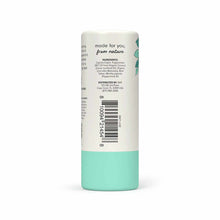 Cylindrical stick balm with cream-colored upper half and mint green lower half, showing ingredient list and barcode.