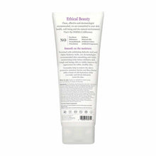 White tube of Derma E body lotion with purple and gray text on the front label describing product benefits and ingredients.