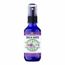 Blue glass spray bottle of Black Earth Zeolite Detox 4 Kids by The Food Movement, 1 fl oz, with purple and white label.