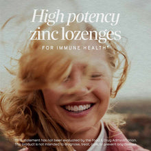 Bottle of Natures Way zinc lozenges in wild berry flavor with product text displayed on packaging.