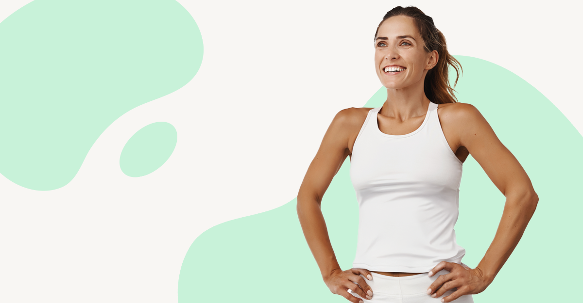 A young women in athletic clothing in front of a white and green background