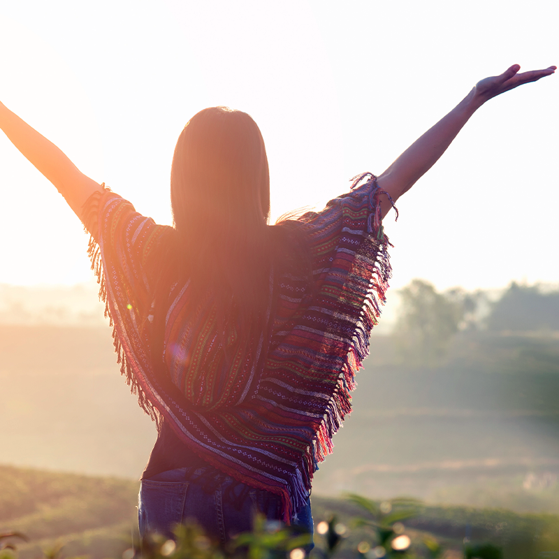 Woman with arms in the air