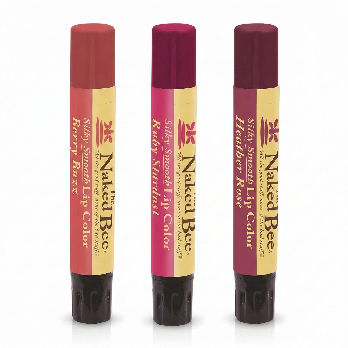 Three lip color tubes in shades of red, burgundy, and deep plum with gold and cream labels.