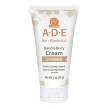 White tube of Carlson Labs A.D.E. hand and body cream with aloe and vitamins D and E, unscented formula, 2 oz size.