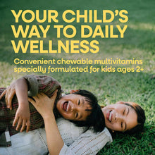 Bottle of Alive Kids chewable multivitamin with yellow text and photo of two children playing on grass.