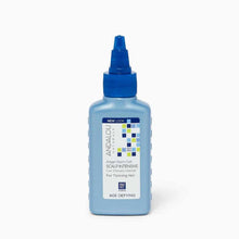 Light blue bottle with blue applicator cap labeled Andalou Naturals Argan Stem Cell Scalp Intensive for Thinning Hair.