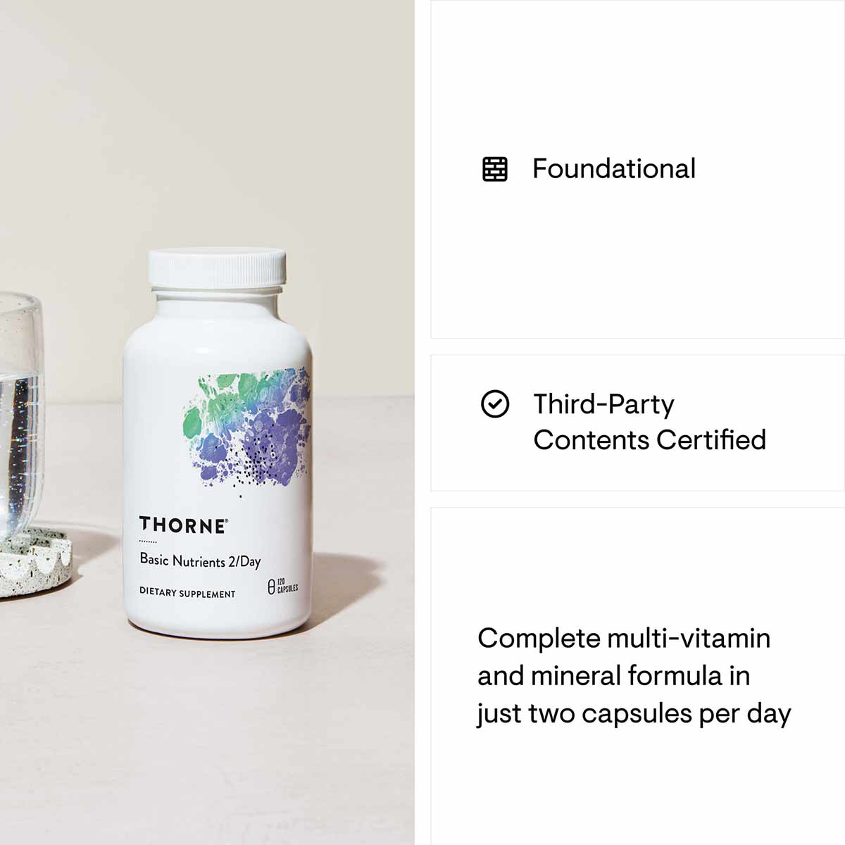 White supplement bottle labeled "THORNE Basic Nutrients 2/Day" with colorful watercolor design and white cap.