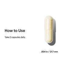 Cream and yellow capsule measuring 21.7mm with usage instructions stating take 2 capsules daily.