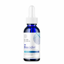 Dark blue glass bottle with white dropper cap and label reading "Biocidin Broad-Spectrum Liquid Formula" by Biocidin Botanica