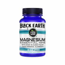 Blue bottle of Black Earth Magnesium Essential Nine supplement with black screw cap, containing 30 vegan capsules.