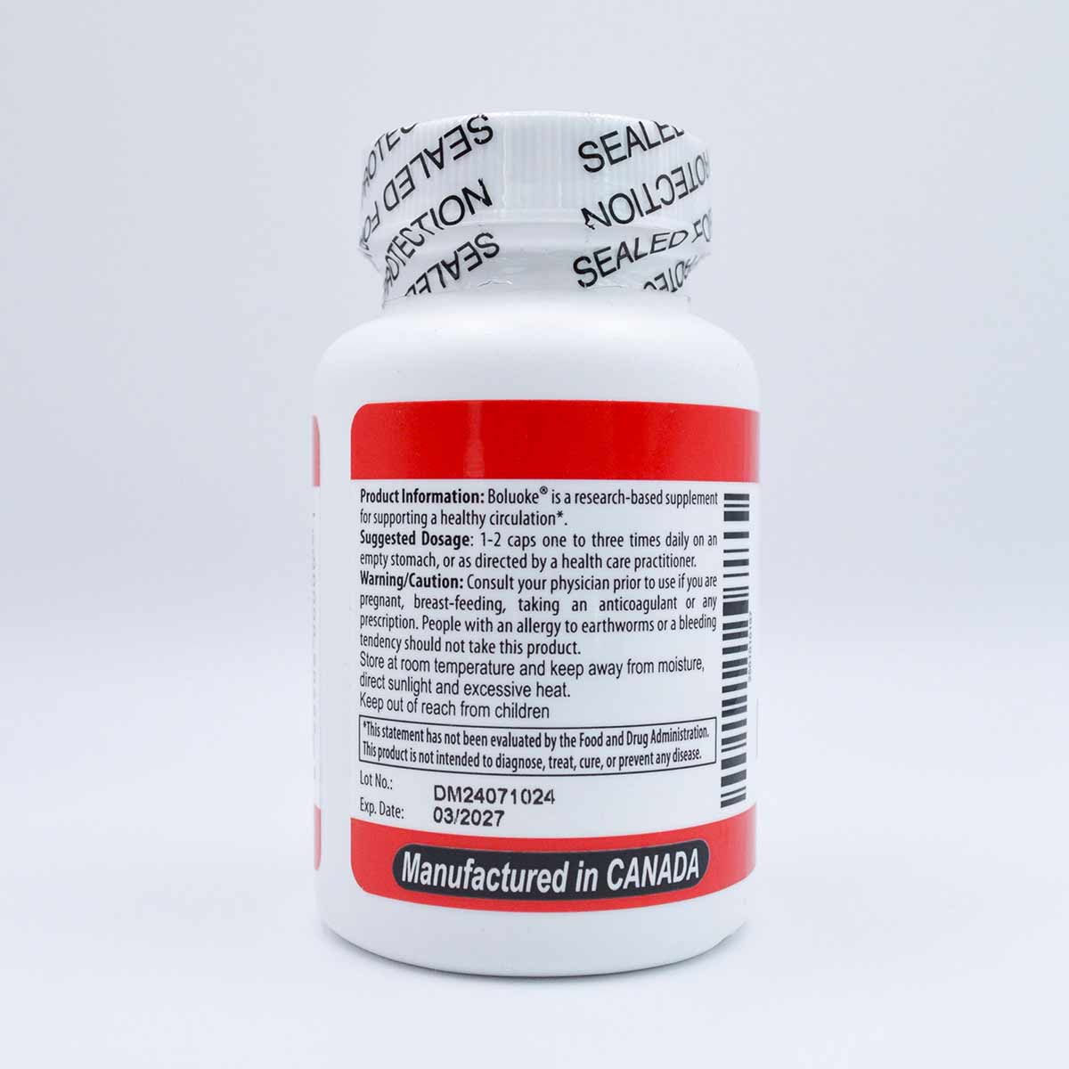 White supplement bottle with red label, tamper-evident seal, and product information text, manufactured in Canada.