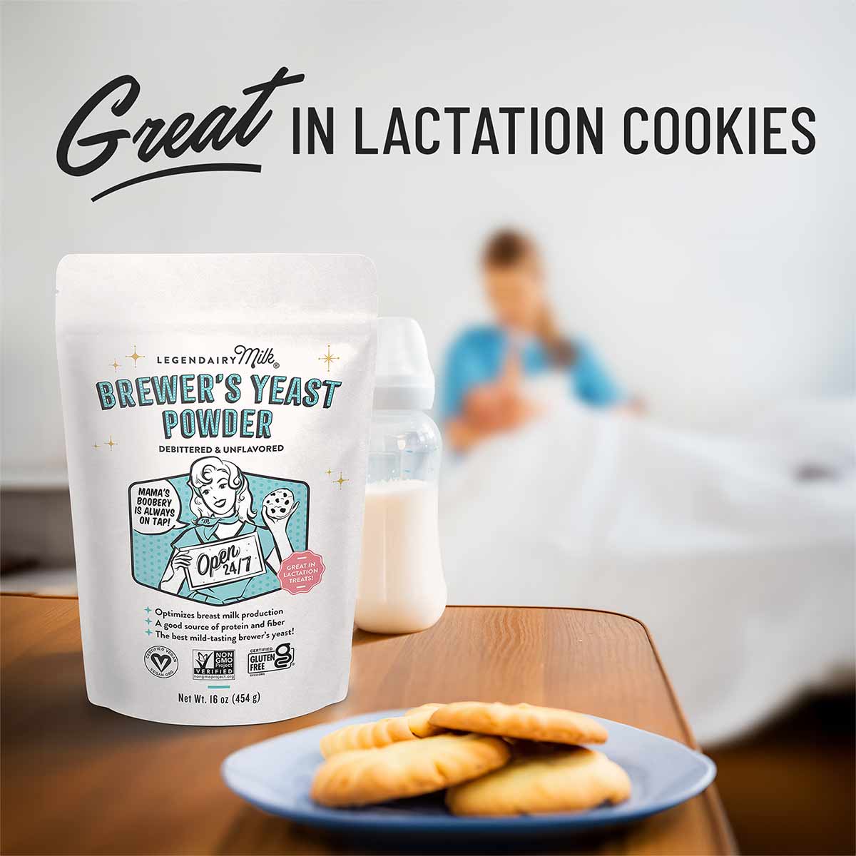 Legendairy Milk Brewer's Yeast Powder pouch next to milk bottle and cookies on table.