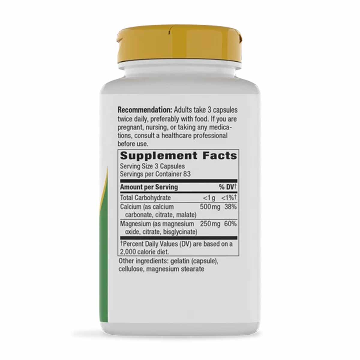 White supplement bottle with gold cap showing calcium and magnesium mineral complex label and supplement facts.