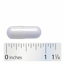 Clear capsule supplement next to ruler showing approximately one inch in length.