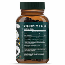 Brown glass bottle with green cap containing dark capsules and Supplement Facts label with herbal ingredients list.