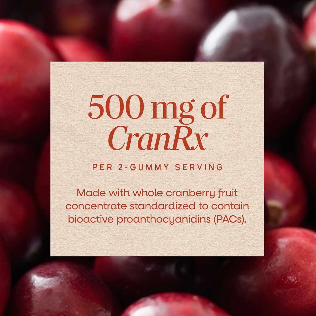 Cream-colored label with red text displaying dosage information for CranRx gummies, positioned over fresh cranberries in back