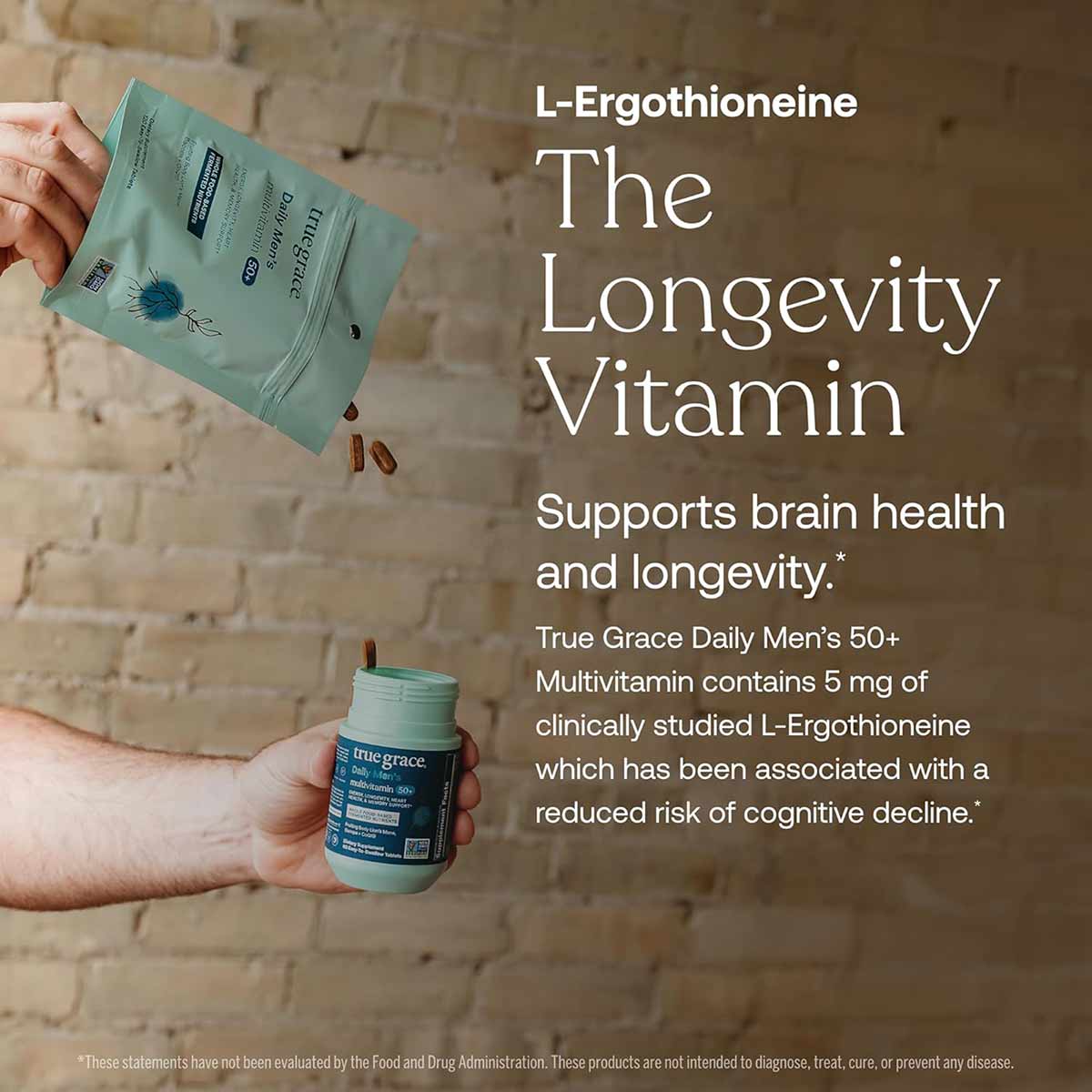 Teal supplement bottle and pouch of True Grace Daily Men's 50+ Multivitamin held in hands against brick background.
