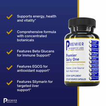 Black and white bottle of Premier Daily One dietary supplement capsules with gold label band and ingredient information on bl