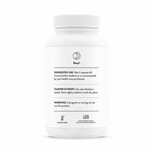 White supplement bottle with white ribbed cap labeled "Sleep†" containing usage and warning information on label.