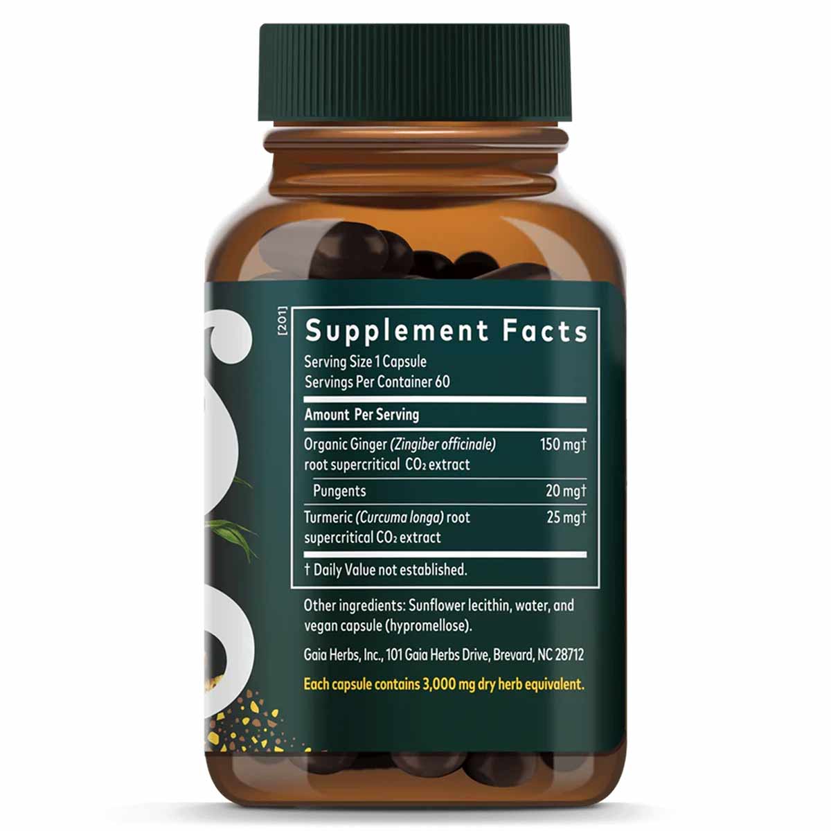 Amber glass bottle with green cap containing dark capsules, labeled with Supplement Facts showing ginger and turmeric ingredi