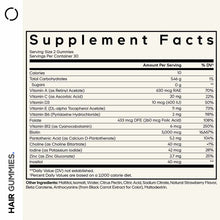 Supplement Facts label for hair gummies showing serving size, nutritional content, and ingredients including biotin, vitamins