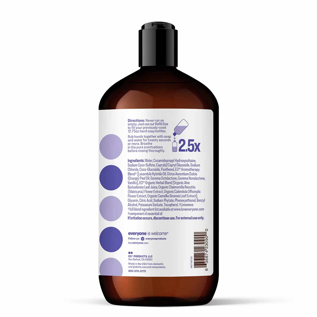 Amber glass bottle of liquid hand soap with black pump top and white label featuring purple circular color swatches and produ