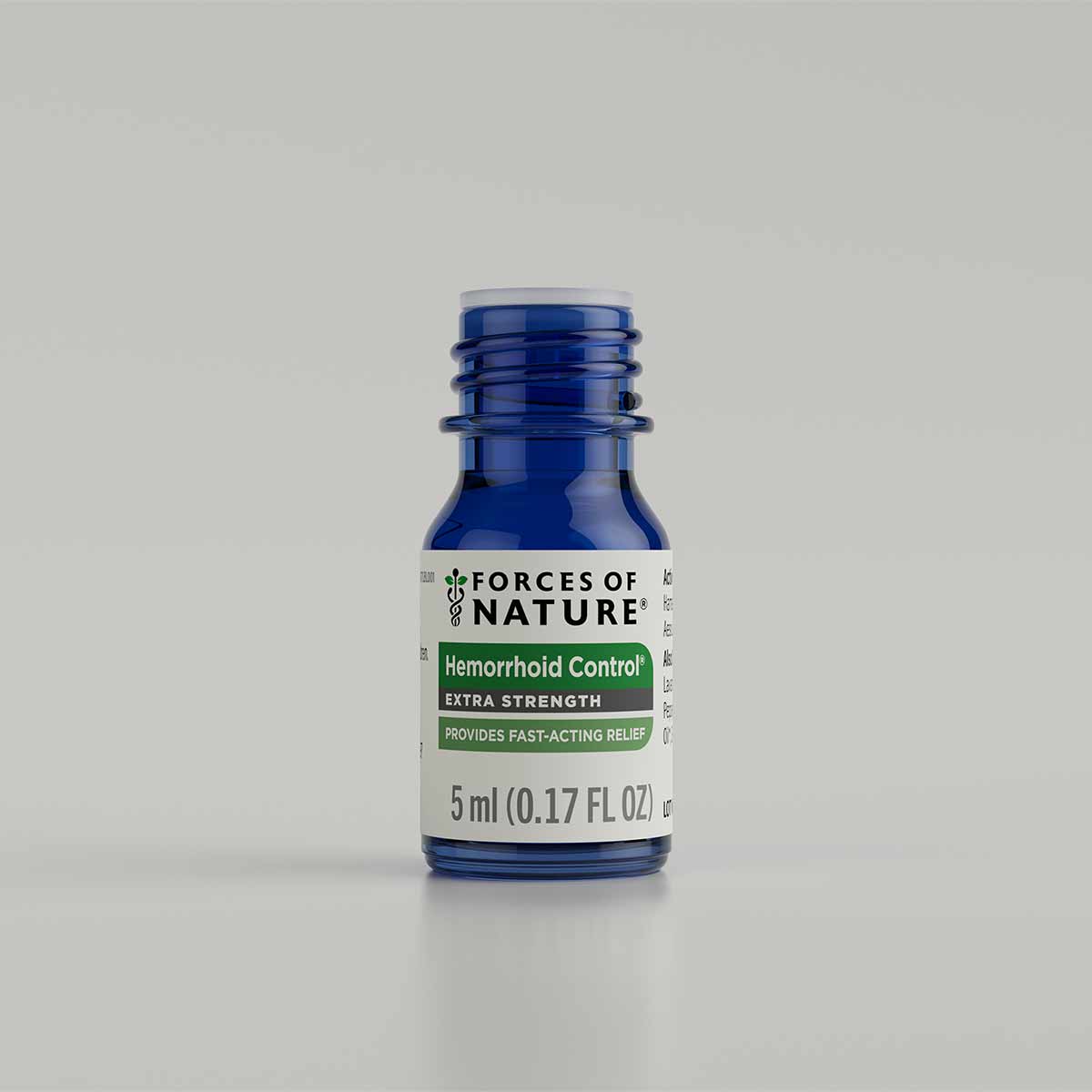 Blue glass bottle with white label reading "Forces of Nature Hemorrhoid Control Extra Strength," 5 ml size.