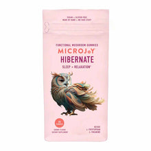 Pink pouch of MicroJoy Hibernate functional mushroom gummies with illustrated owl, labeled vegan and gluten free, 30 count.