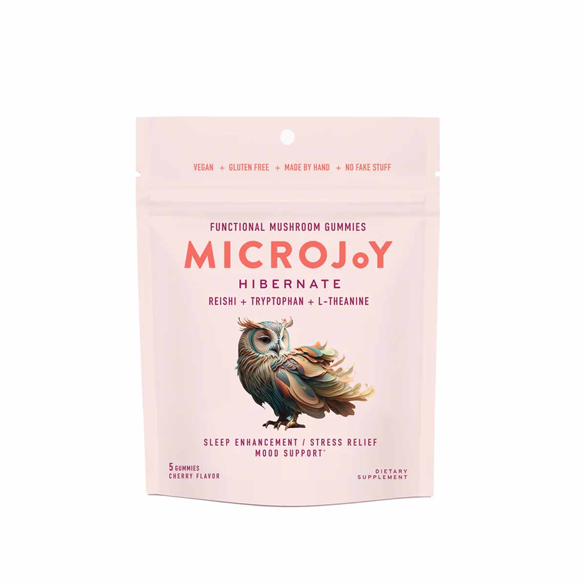 Pink pouch of MicroJoy Hibernate functional mushroom gummies with owl illustration and cherry flavor, vegan and gluten-free.